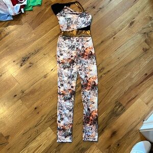 Weissman bronze and animal print dance costume.